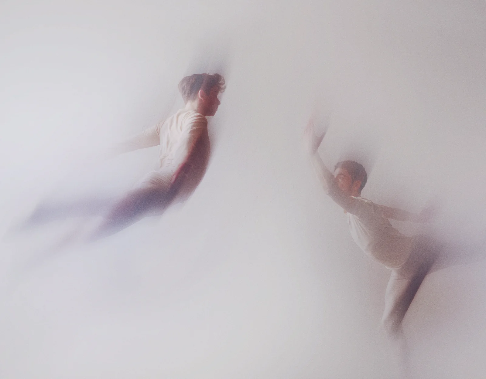 Two figures moving toward one another.